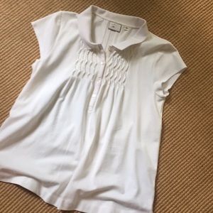 Anthropologie White smocked flared polo